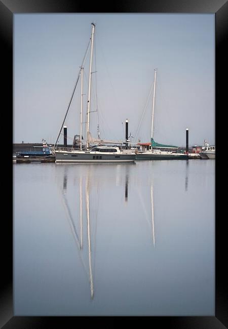 Morning calm over Brightlingsea Harbour with great reflections  Framed Print by Tony lopez