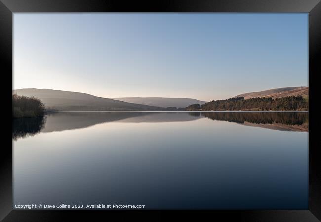 Reflections in Catcleugh Reservoir on a very calm day in Northumberland, England Framed Print by Dave Collins