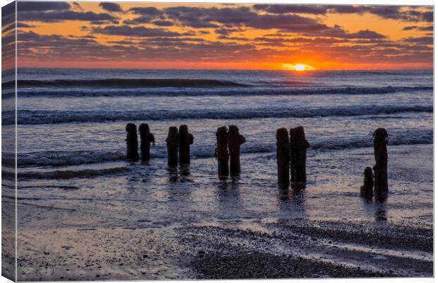 Here comes the sun at Sandsend Canvas Print by Tim Hill