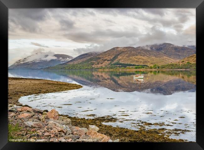 Serenity in the Scottish Loch Framed Print by Terry Newman