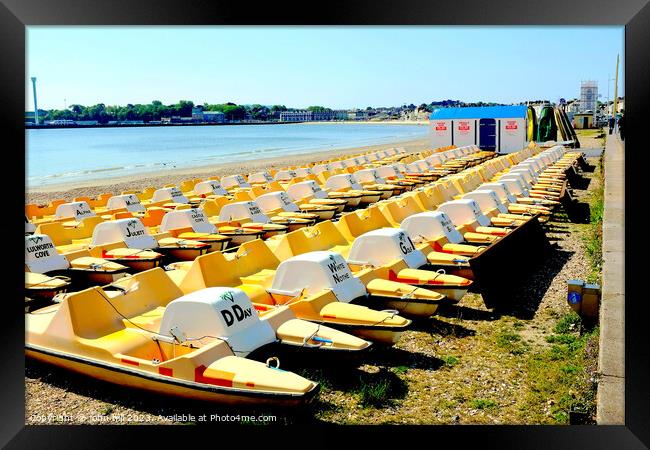 Pedalos on the beach, Weymouth, Dorset, UK. Framed Print by john hill