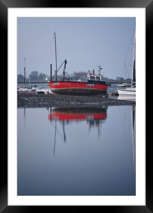 Low tide over Brightlingsea Harbour in reflection  Framed Mounted Print by Tony lopez