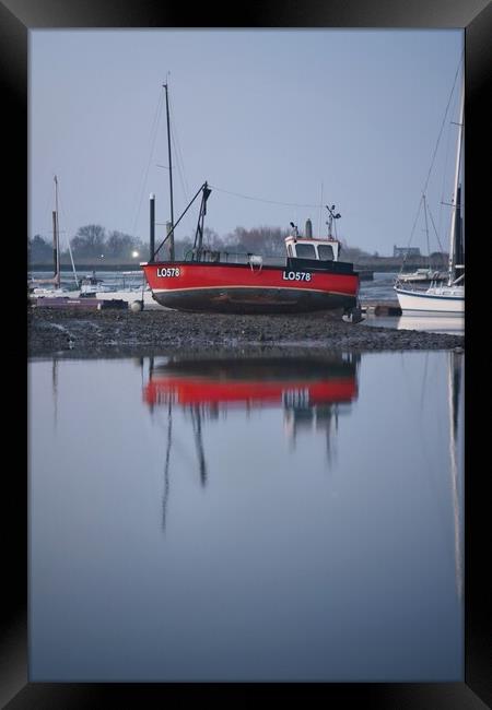 Low tide over Brightlingsea Harbour in reflection  Framed Print by Tony lopez
