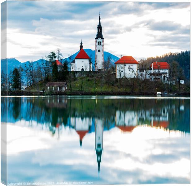 Lake Bled and the Island church Canvas Print by Ian Middleton