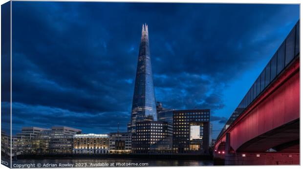 The Shard & London Bridge at blue hour Canvas Print by Adrian Rowley