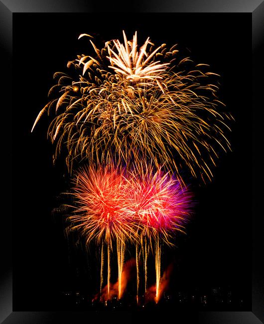 Fireworks Celebration Framed Print by Chris Lord