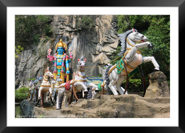 Hindu God with horse carriage at Ramayana Cave Framed Mounted Print by Hanif Setiawan