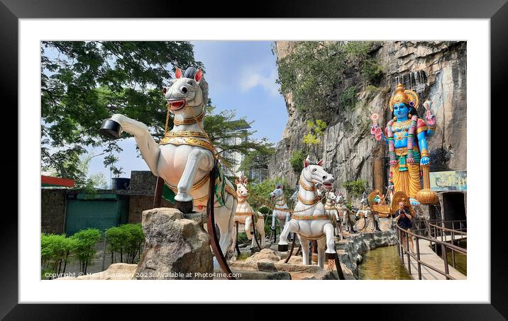 Hindu statue on horse carriage at Ramayana Cave Framed Mounted Print by Hanif Setiawan