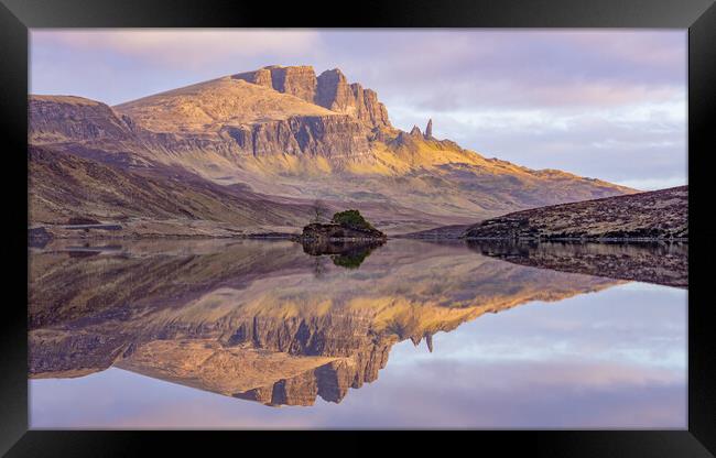 The old man of storr reflected in loch fada at Sun Framed Print by Kevin Winter