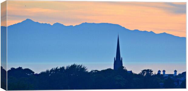 Rugged mountains on Arran and Ayr buildings Canvas Print by Allan Durward Photography