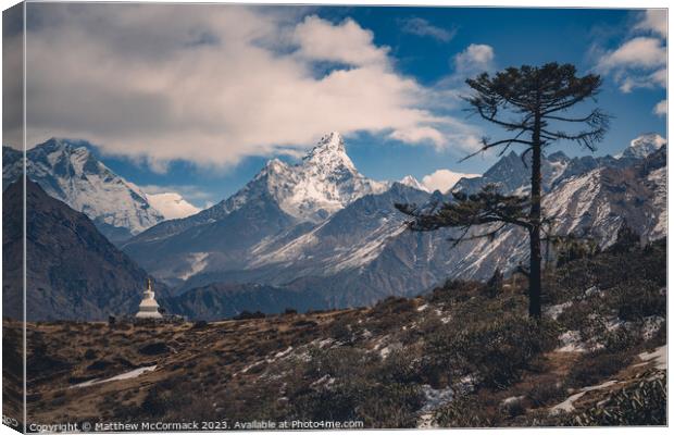 Tall tree and Mountain Peak Canvas Print by Matthew McCormack