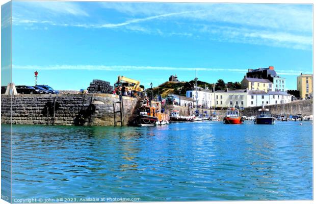 Returning Ferry, Tenby, Wales. Canvas Print by john hill