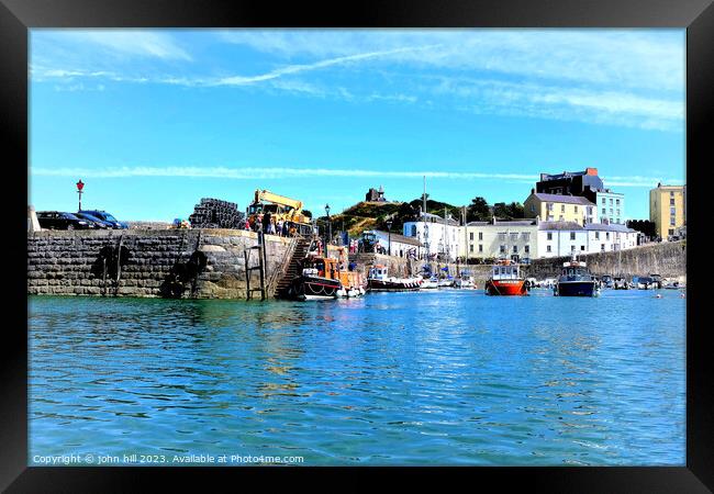 Returning Ferry, Tenby, Wales. Framed Print by john hill