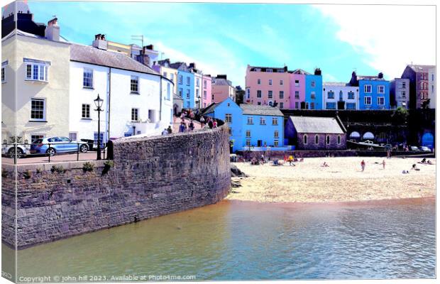 Harbor beach, Tenby, South Wales, UK. Canvas Print by john hill