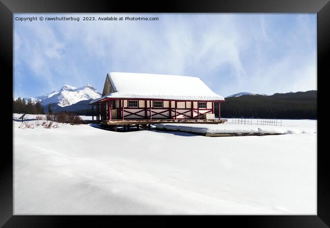 Snowy Maligne Lake Boat House Framed Print by rawshutterbug 