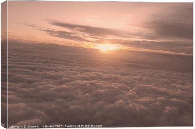 Sunrise Above the Clouds Canvas Print by Elaine Anne Baxter
