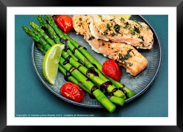 Salmon prepared with asparagus. Framed Mounted Print by Mykola Lunov Mykola