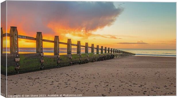 Majestic Sunrise at Dawlish Warren Beach Canvas Print by Ian Stone