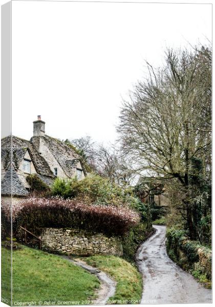 Winding Lane Past Quintessential English Cotswold Cottages In Bi Canvas Print by Peter Greenway