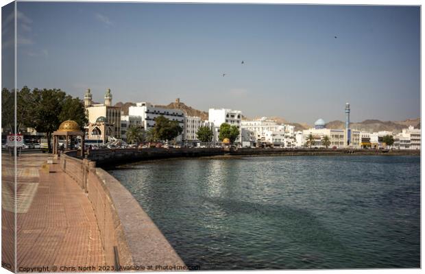 Muscat Waterfront Canvas Print by Chris North