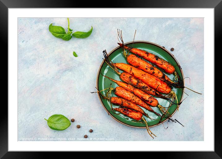 Appetizing baked carrots, copy space Framed Mounted Print by Mykola Lunov Mykola
