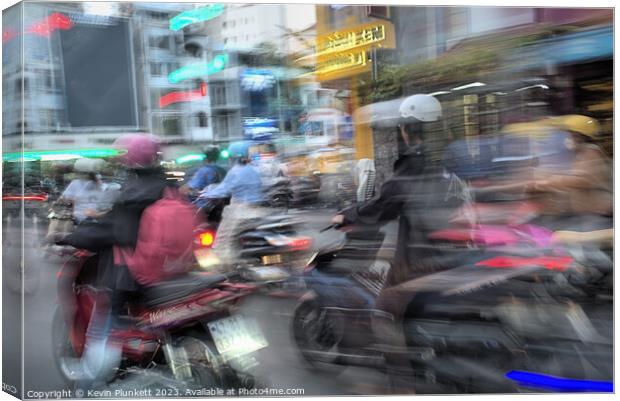 Saigon rush-hour  Canvas Print by Kevin Plunkett