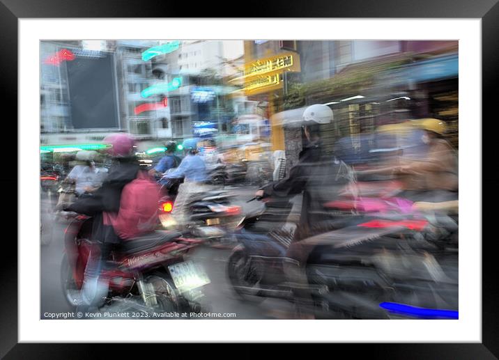 Saigon rush-hour  Framed Mounted Print by Kevin Plunkett