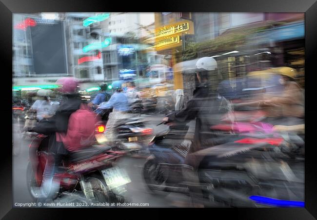 Saigon rush-hour  Framed Print by Kevin Plunkett