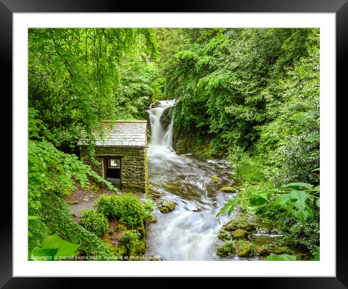 Hut and Waterfall Framed Mounted Print by Darrell Evans