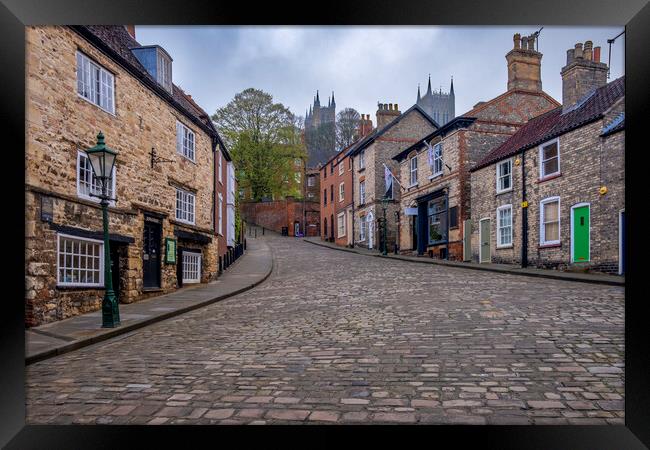 Discover historic charm on Steep Hill Framed Print by Steve Smith