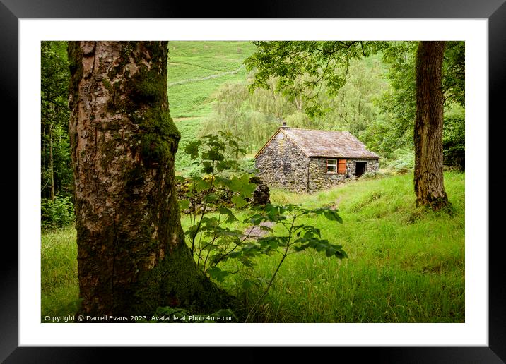 Stone hut in the woods Framed Mounted Print by Darrell Evans