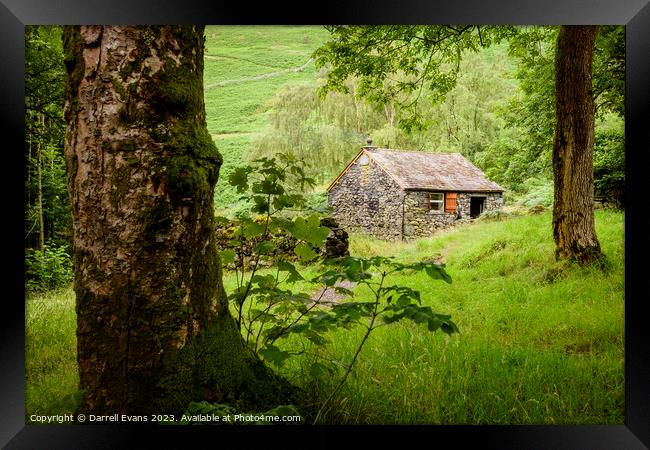 Stone hut in the woods Framed Print by Darrell Evans