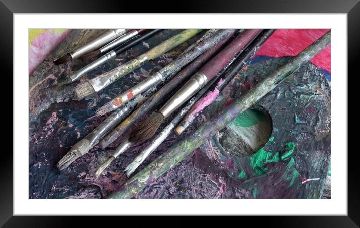 Used brushes on an artist's palette of colorful oil paint Framed Mounted Print by Irena Chlubna