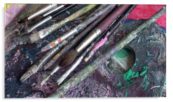 Used brushes on an artist's palette of colorful oil paint Acrylic by Irena Chlubna