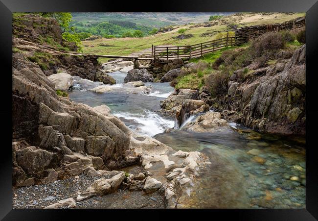 Stone footbridge in Cwm Llan, Snowdonia, Wales Framed Print by Andrew Kearton