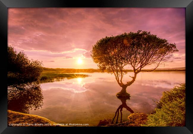 Sunset over Kenfig Pool Framed Print by Terry Brooks