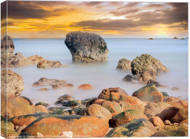 Radiant Sunrise over Scotland's Rocky Outcrop Canvas Print by Steven King