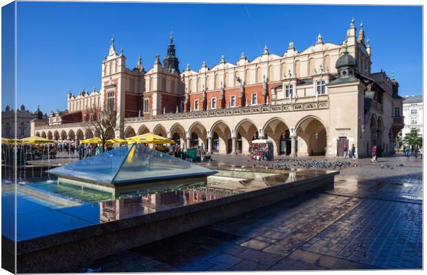 Fountain and Cloth Hall on Main Square in Krakow Canvas Print by Artur Bogacki