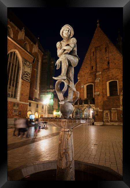 Student Statue at Night in Krakow Framed Print by Artur Bogacki