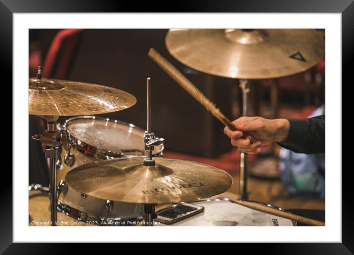 striking the drums and cymbals Framed Mounted Print by Ben Delves