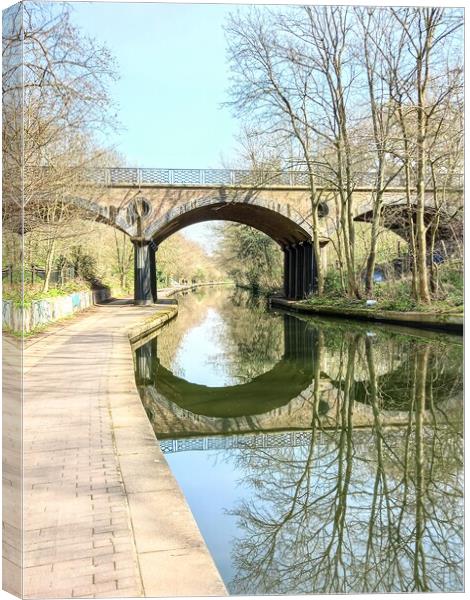 Serenity on Regent's Canal Canvas Print by Peter Lewis
