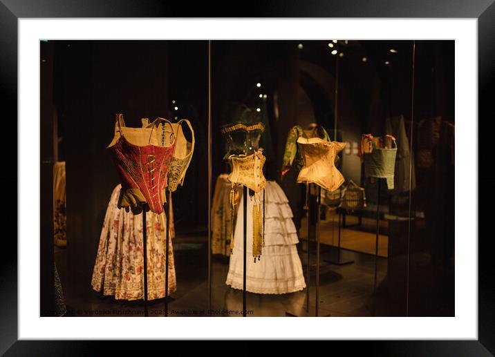 Old fashion corsets and skirts  Framed Mounted Print by Veronika Druzhnieva