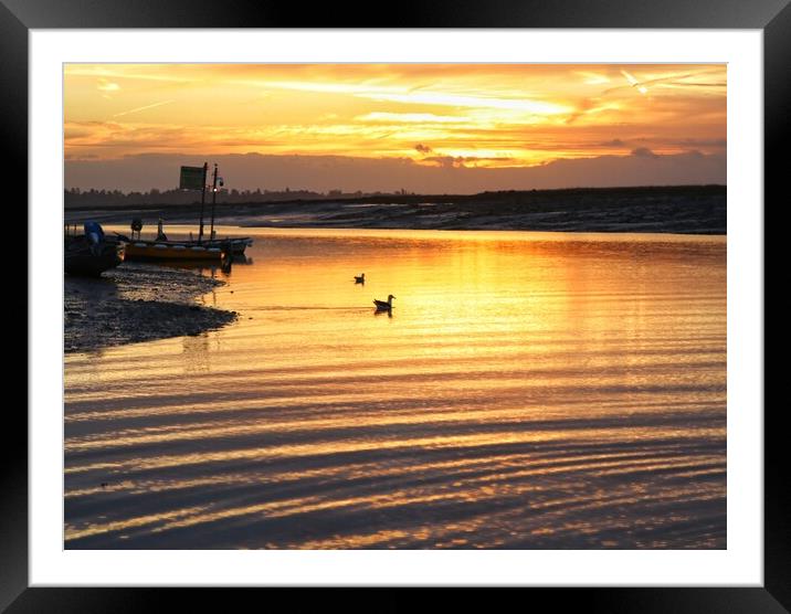 Golden sunrise over the Brightlingsea Creek  Framed Mounted Print by Tony lopez