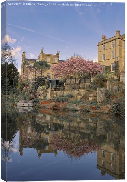 Spring golden and pink reflections along the Kennett and Avon canal in Bath Canvas Print by Duncan Savidge