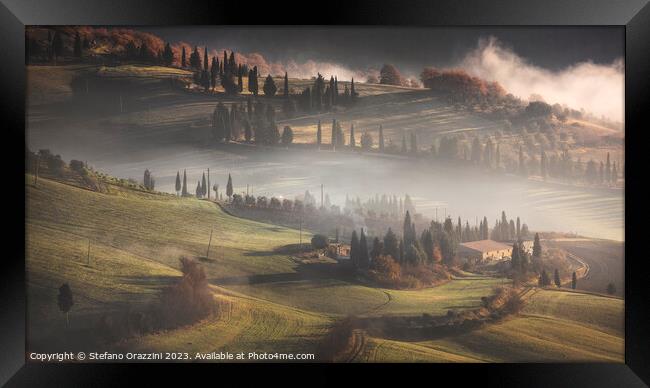 Foggy morning in Val d'Orcia. Tuscany, Italy Framed Print by Stefano Orazzini