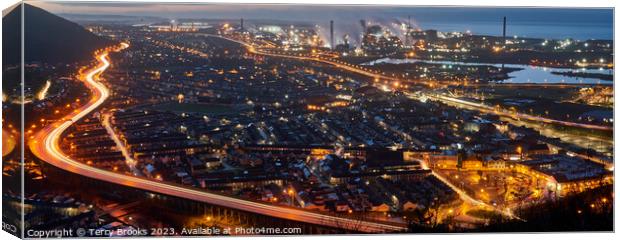 Port Talbot and Steel Works at night with the trails of car lights on the M4 motorway Canvas Print by Terry Brooks