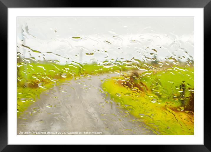 Abstract image of rural road, through the wet window Framed Mounted Print by Laurent Renault