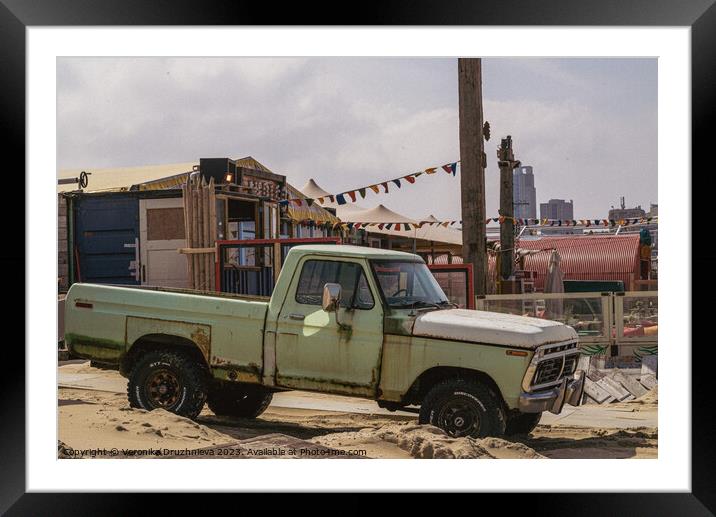 Old Ford on the Den Haag beach. Framed Mounted Print by Veronika Druzhnieva