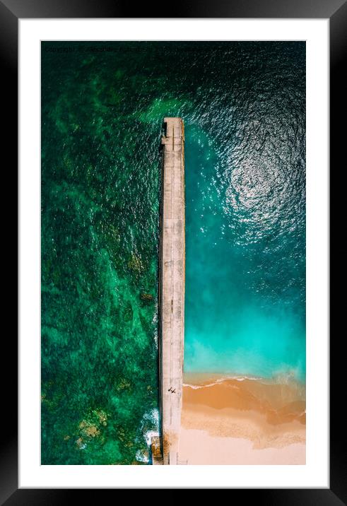 Top down aerial view of amazing colours at a beach and pier Framed Mounted Print by Alexandre Rotenberg