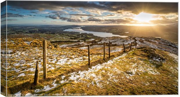 Wansfell Pike sunset with Windermere in the background Canvas Print by Julian Carnell